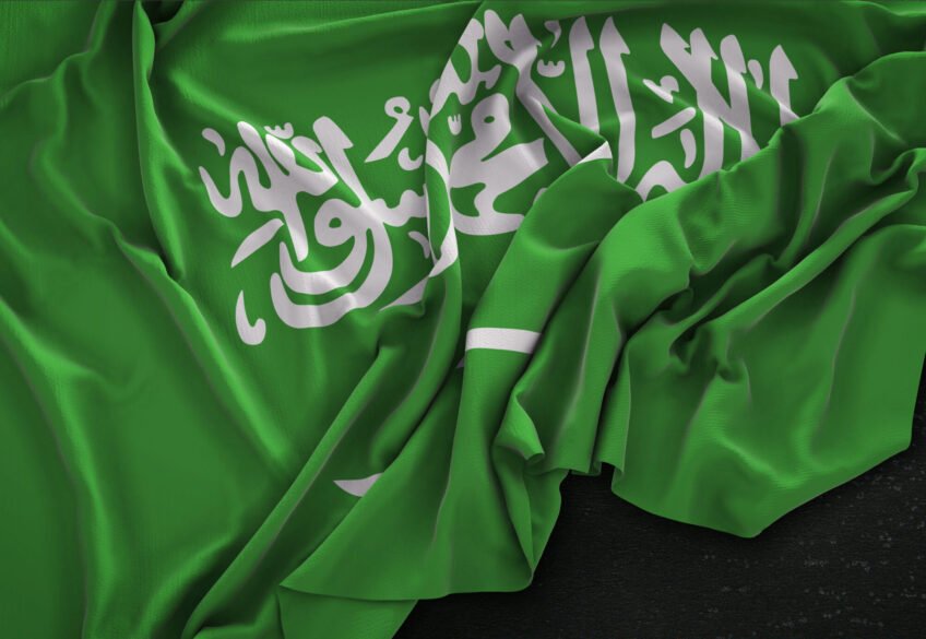 Saudi Arabia Flag Wrinkled On Dark Background 3D Render
